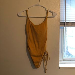 Mustard yellow one piece bathing suit